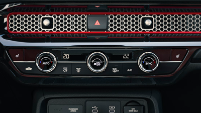 Closeup of climate control dials. 